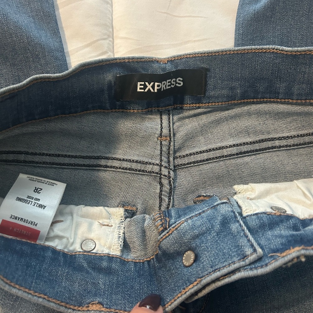 Express mid rise shark bite ankle legging jeans